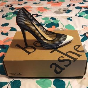 Black high heel with white tip size 7.5